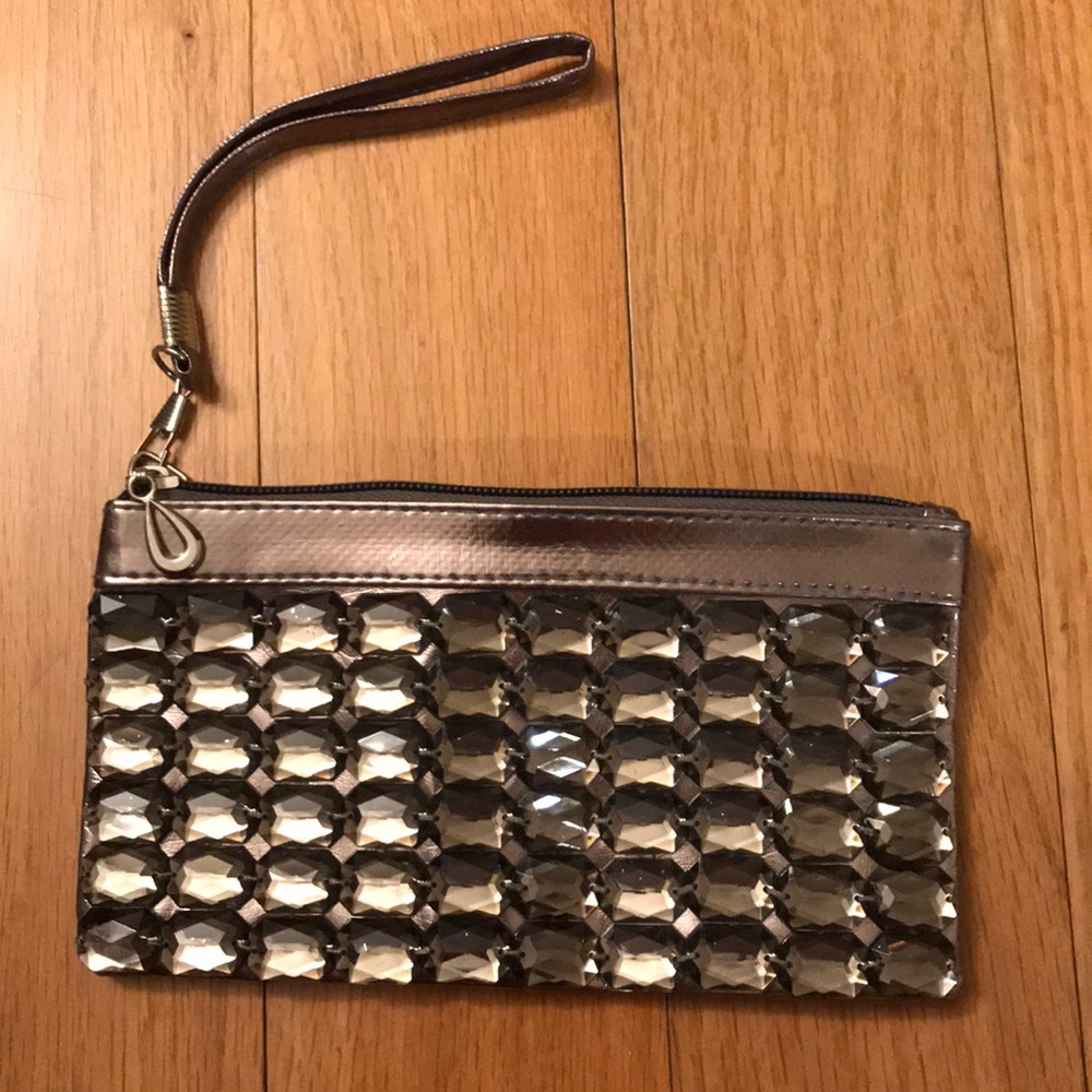 Bronze color with embellishments wristlet